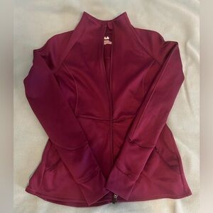 Super cute fitted athletic zip up. Women’s XS